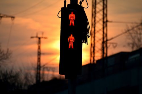 red traffic lights sunset