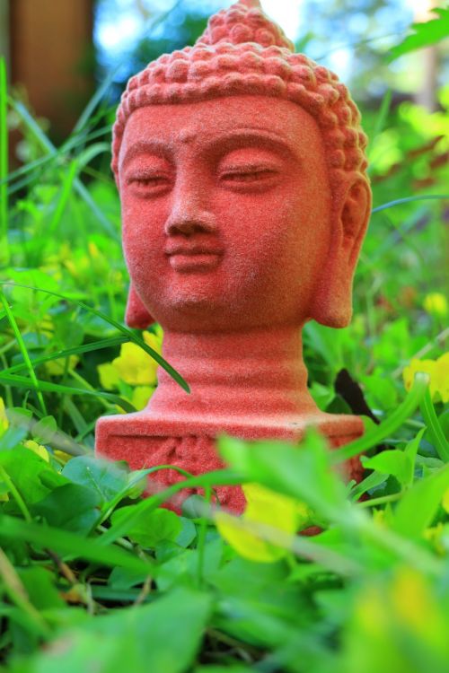 red buddhist buddha statue