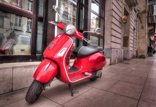 red  scooter  parked