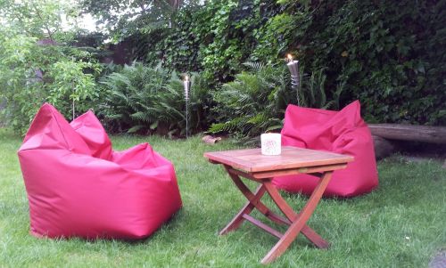 red armchair garden holiday garden