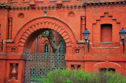 Red Brick Wall And Gate In Park