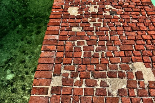 red bricks  ocean  pathway