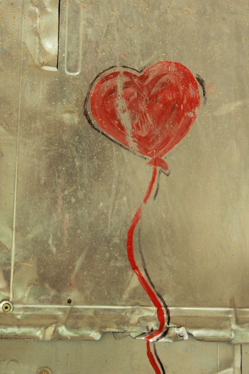 red heart balloon painted street art metal