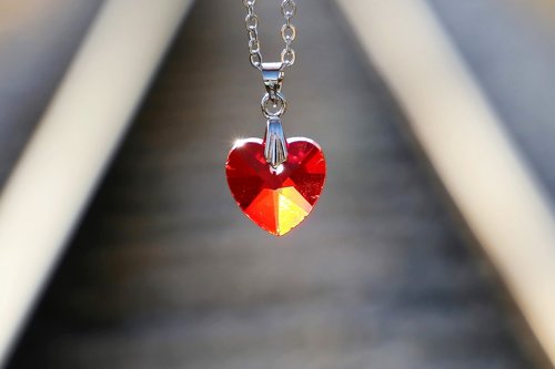 red heart medallion  love symbol  lost love