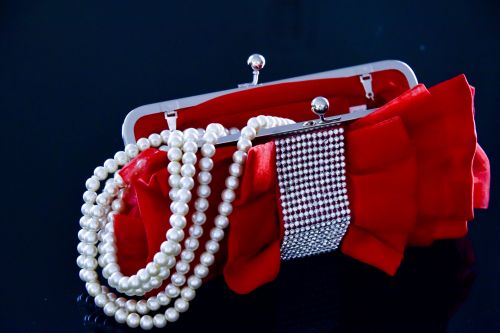 Red Purse And White Pearls