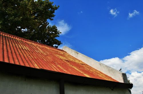 Red Roof Against Blue Sky