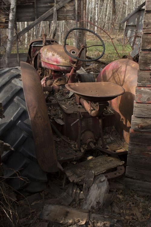 Red Rusty Farm Tractor