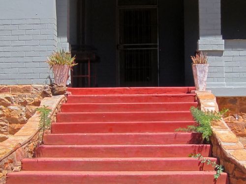 Red Steps At Entrance