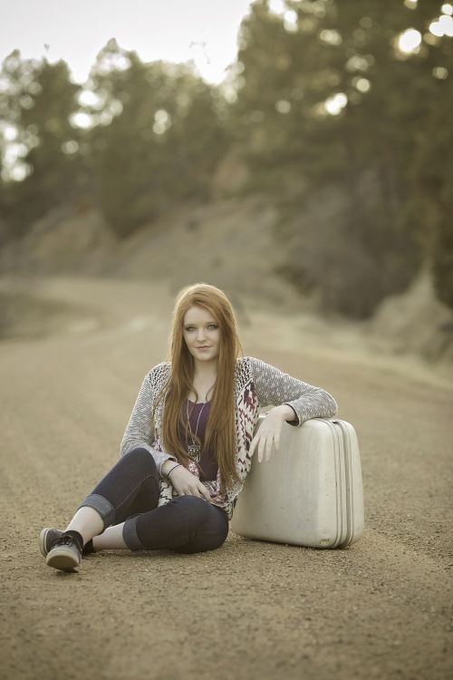 redhead suitcase road