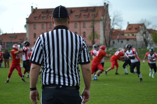 referee black and white clothing american football