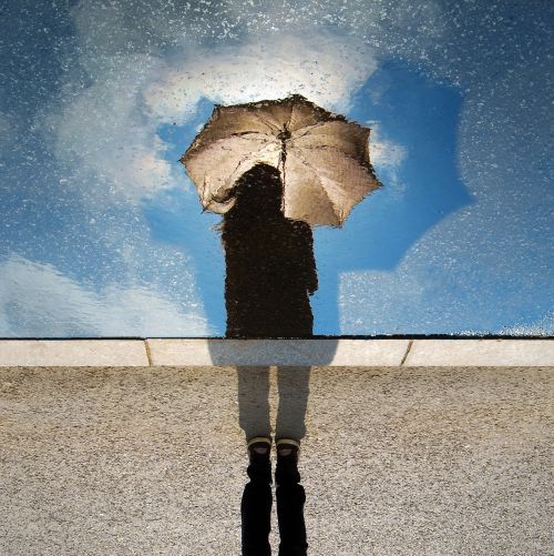 reflection woman silhouette umbrella