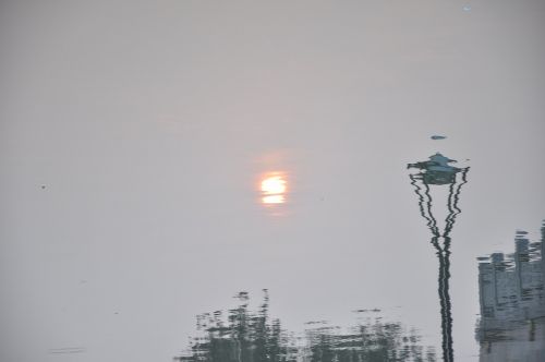 reflection sunrise street lamp