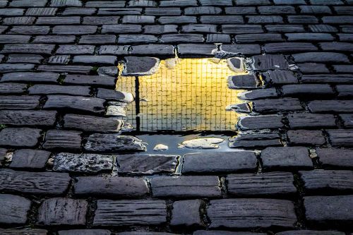 reflection brick road rain