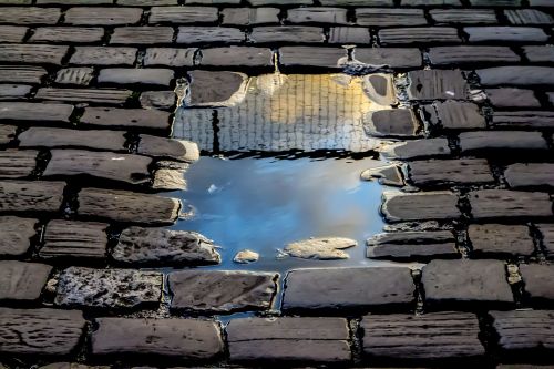 reflection brick road rain