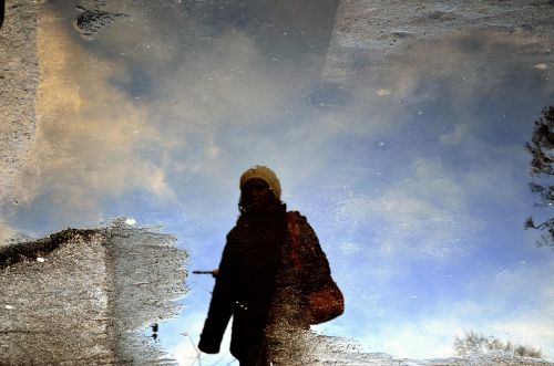 Reflection Of Women In Water