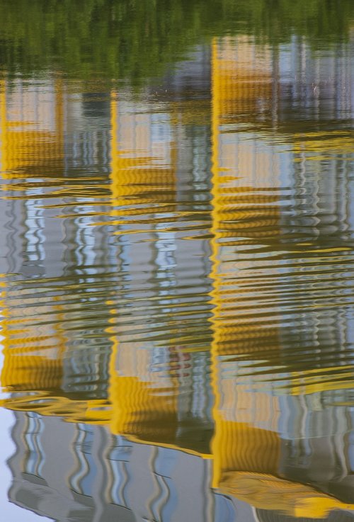 reflections  water  yellow