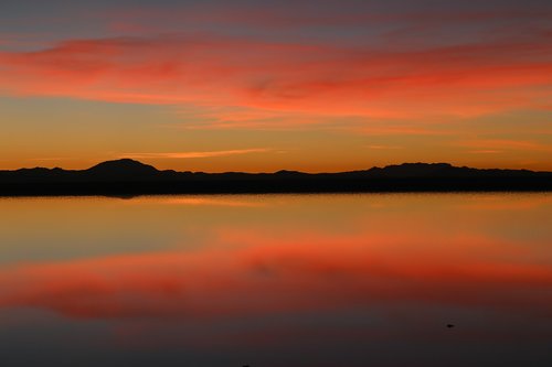 reflections  sunrise  water