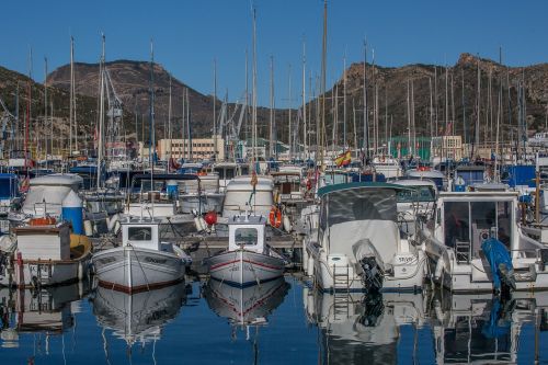 reflections boats water