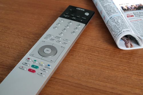 remote control watch tv tv newspaper