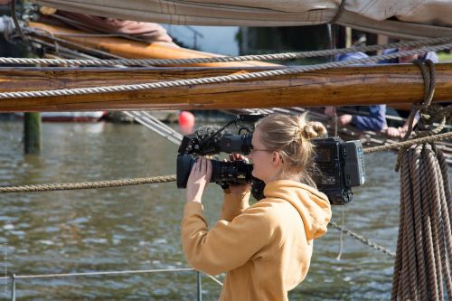 reporter journalist film team