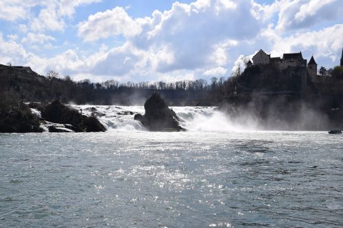 rhine falls waterfall back light