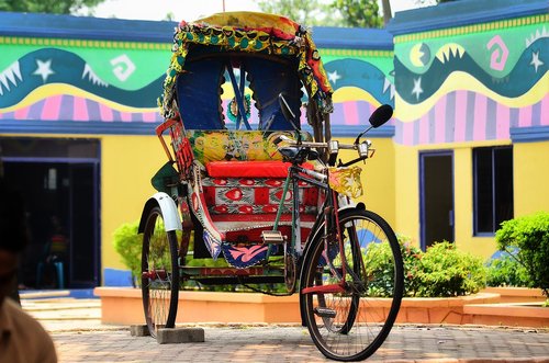 rickshaw  vehicles  cityscape
