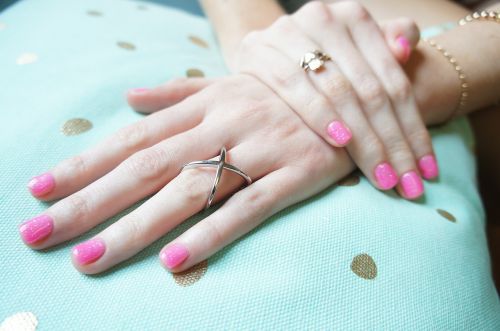 rings hand pink nail polish