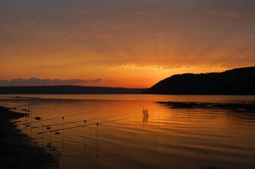 river at sunset fishing