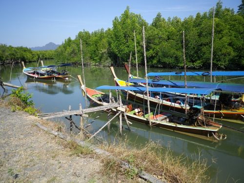 river boats fishing boats