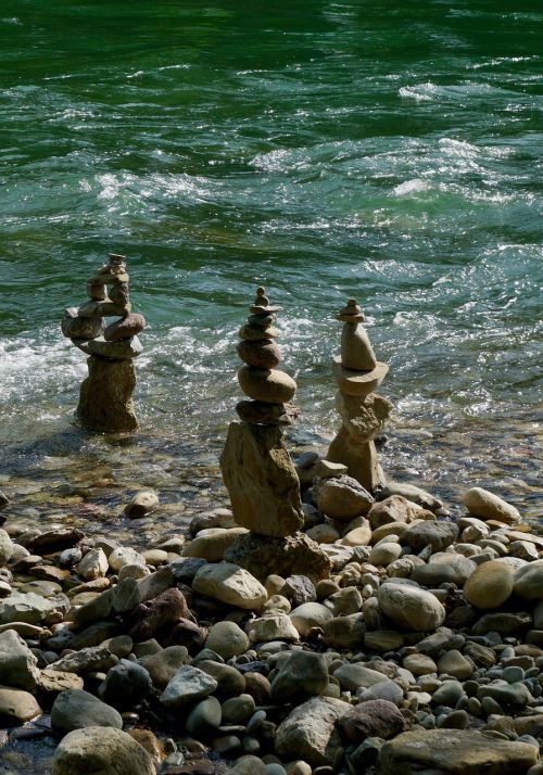 river stones cairn