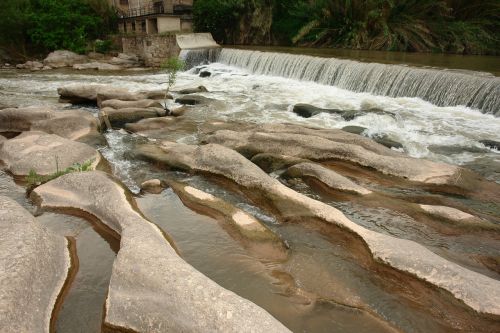 river dam stones