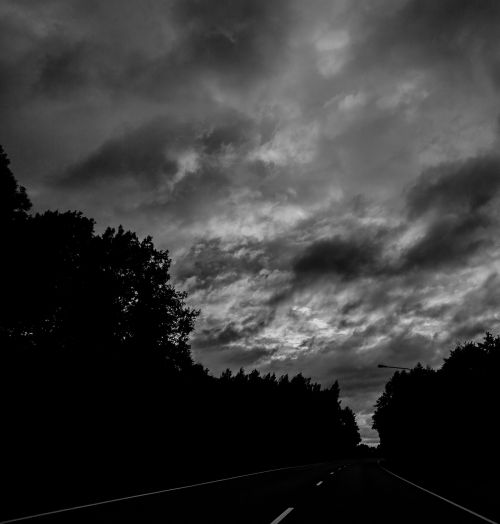 road black and white evening