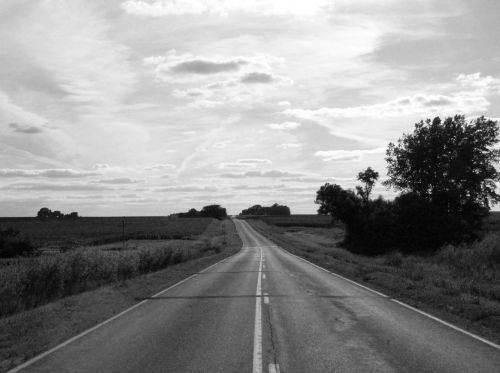 road black and white sky