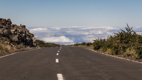 road clouds sky