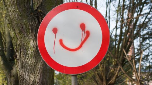 road sign a ban on smiley smiley