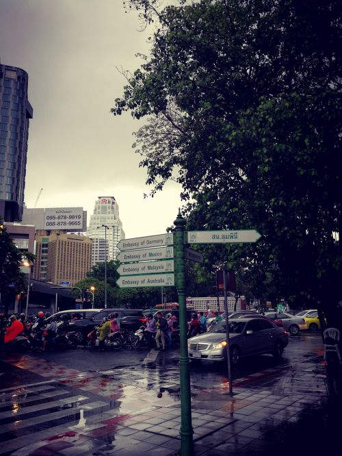 road signs bangkok rain