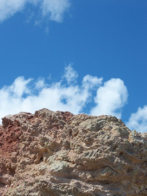 rock clouds blue