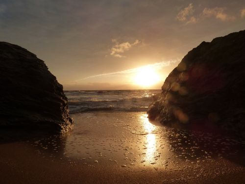 rock sand sunset