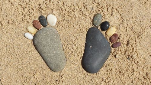 rock feet sand