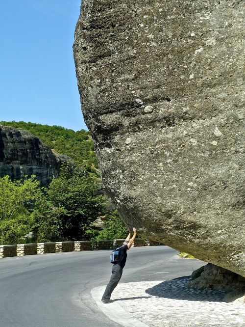 rock holding mighty