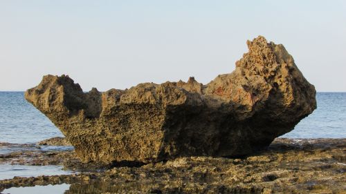 rock formation sea rocky beach