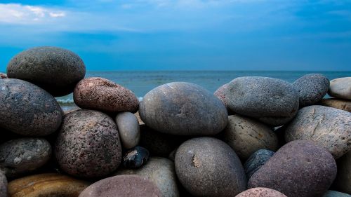 rock wall stones sea