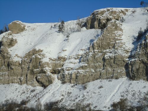 rocks snow mountain