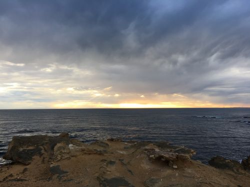 rocks water clouds