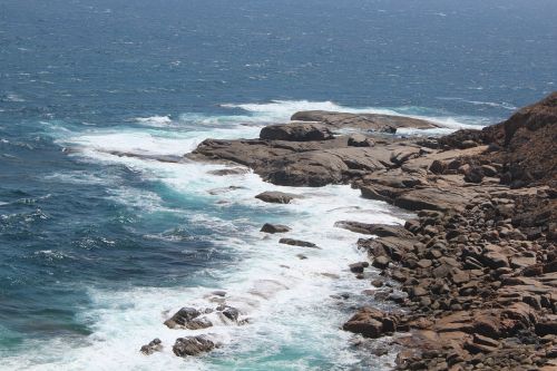 rocks cliffs coast