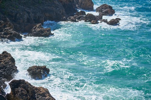 rocks  waves  wind