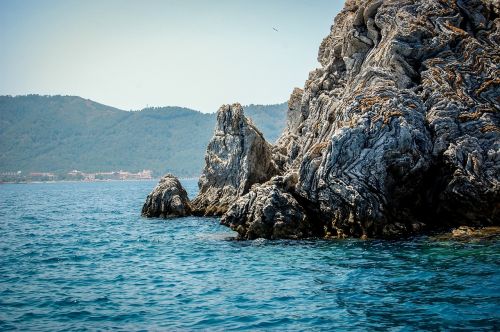 rocks sea mountains