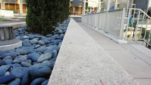 rocks pebbles sidewalk