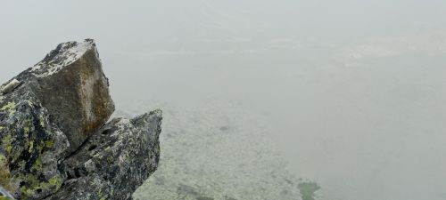 rocks mountain foggy