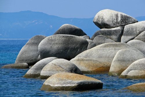 rocks lake mountains